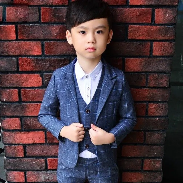 Boy's plaid suit is Quinn's vest.