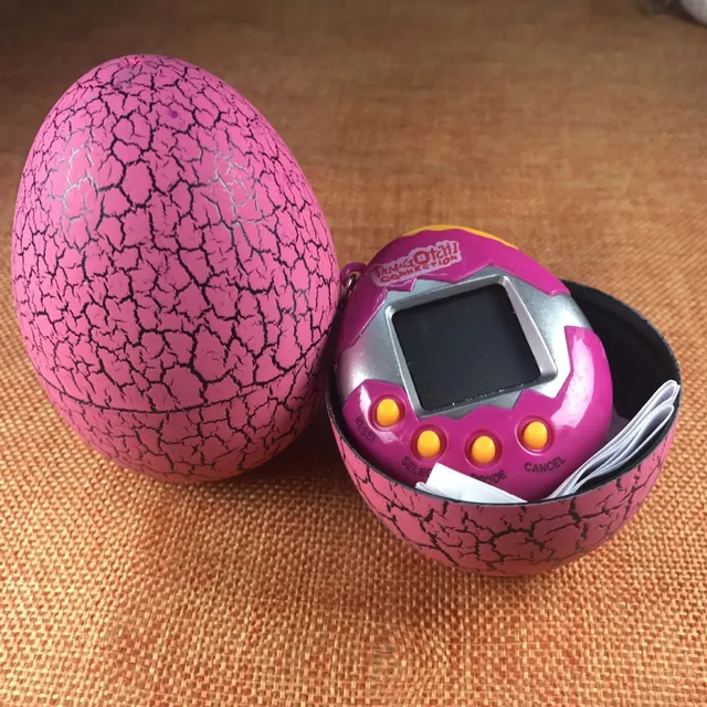 Colored egg with Tamagochi dinosaur - virtual electronic pet - manual digital game P