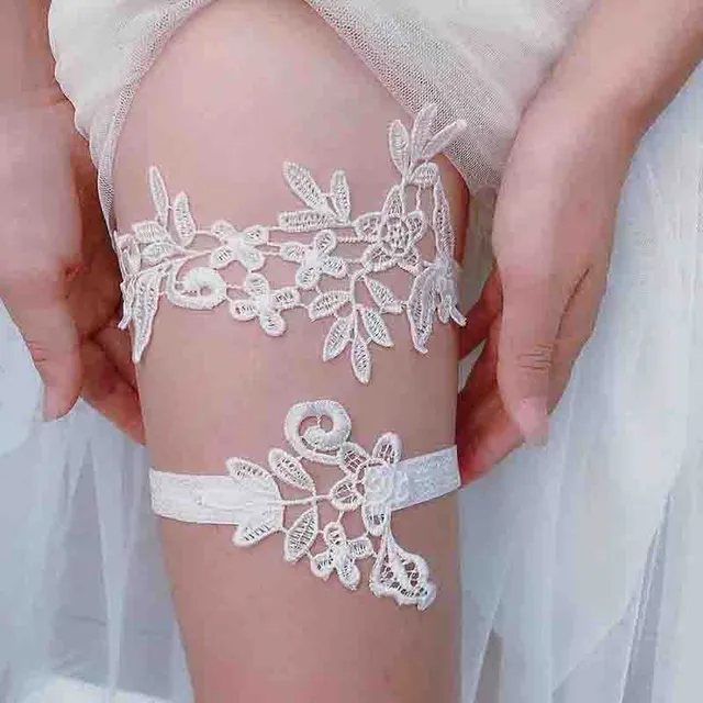 Lace wedding garters in beautiful elegant colors