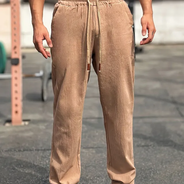 Comfortable men's sweatpants made of cotton, free cut, suitable for outdoor activities