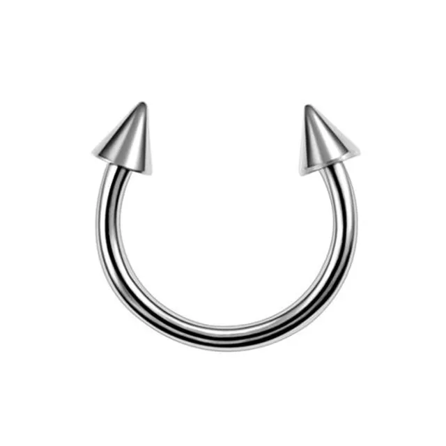 Trendy septum nose piercing with a spike or ball