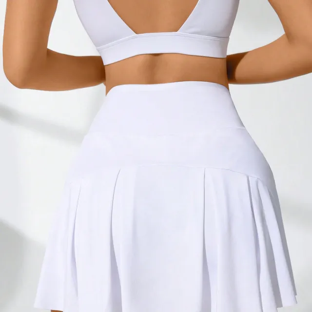 Tennis skirt with a wide ribbon in the waist and a volley line for active movement