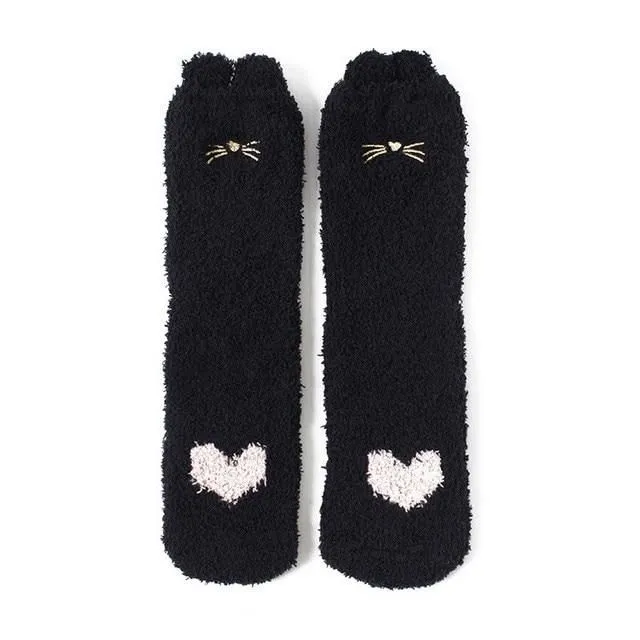 Warm socks in the shape of a paw