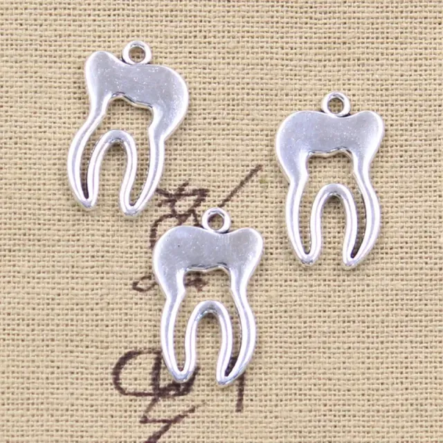 15 pieces of antique silver tooth pendants for DIY jewelry creation