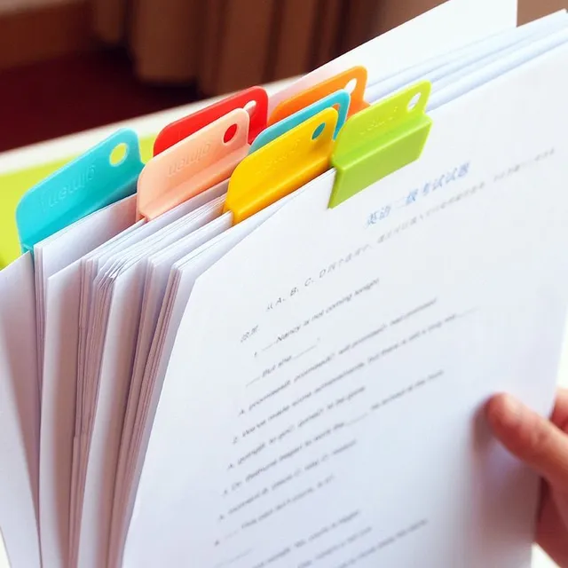 Set of trendy colour modern plastic clips for better organization of important documents