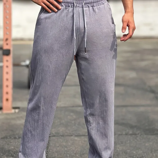 Comfortable men's sweatpants made of cotton, free cut, suitable for outdoor activities