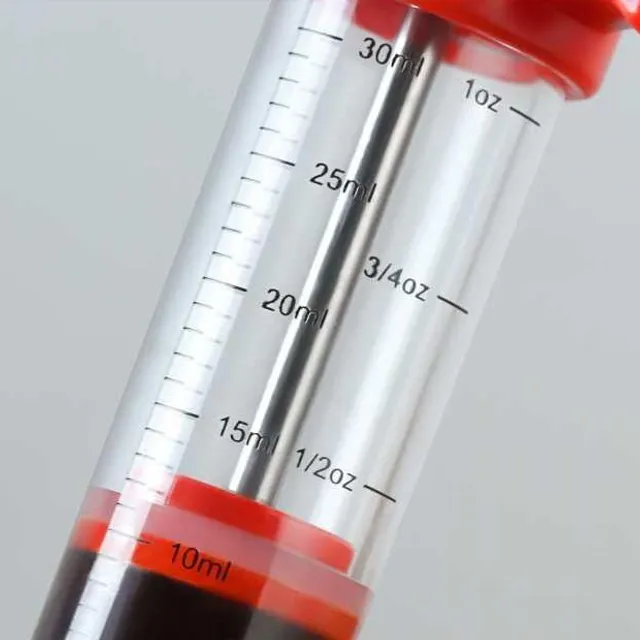 Filling syringe for meat