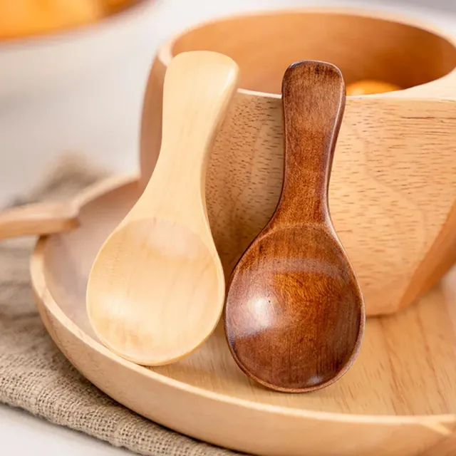 Wooden teaspoon, honey, coffee, spices and other kitchen ingredients