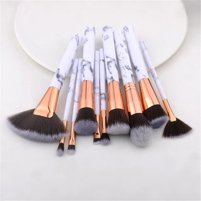 Set of make-up brushes in marble design
