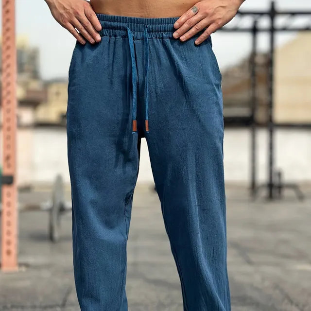 Comfortable men's sweatpants made of cotton, free cut, suitable for outdoor activities