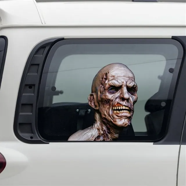 Funny sticker on a car with zombie motif