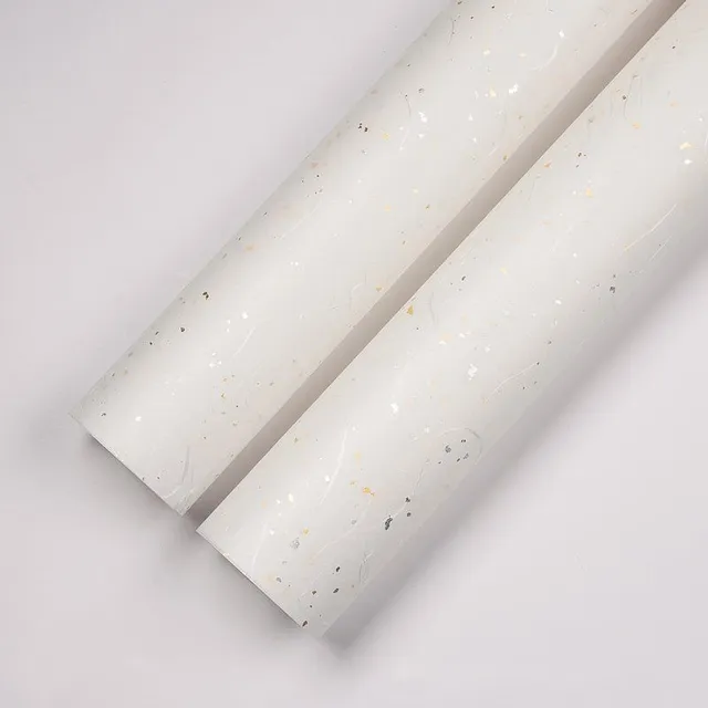 Luksusowy papier pakowy w pastelowych kolorach z metalicznym detalem Danial