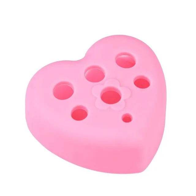 Silicone heart for brush cleaning