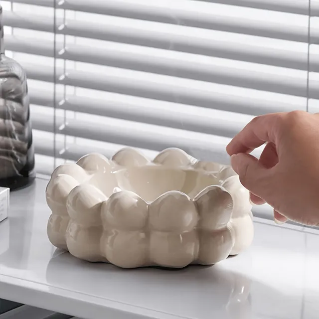 Stylish ceramic ashtray in the shape of a cloud