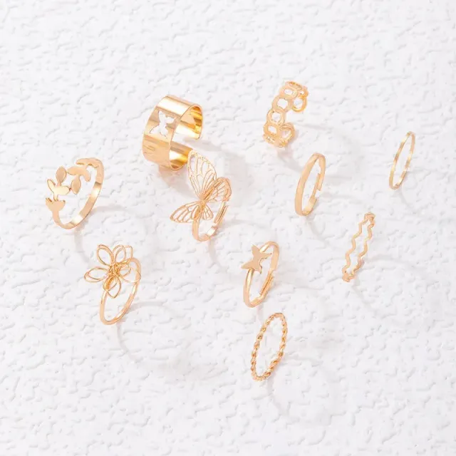 Set of 6-10 geometric rings with butterflies