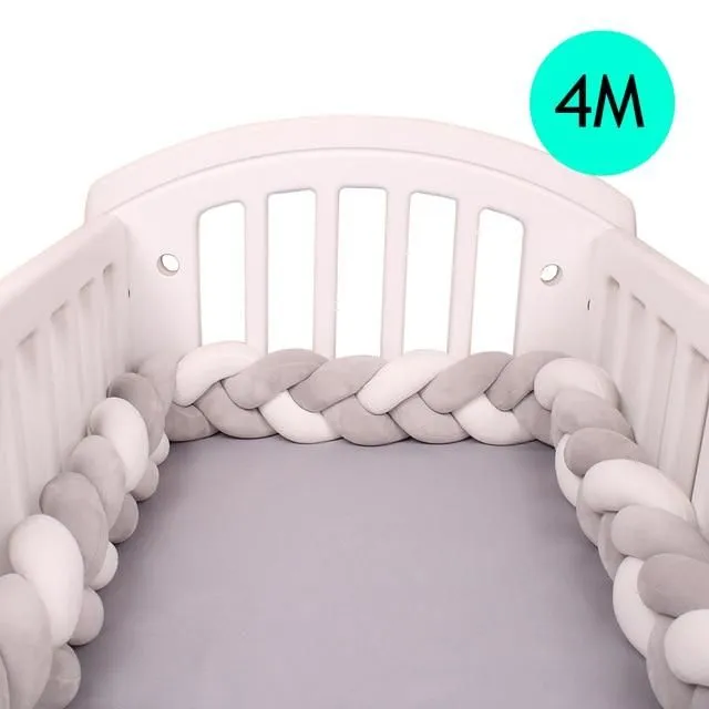 Crib mattress cover in the shape of a braid