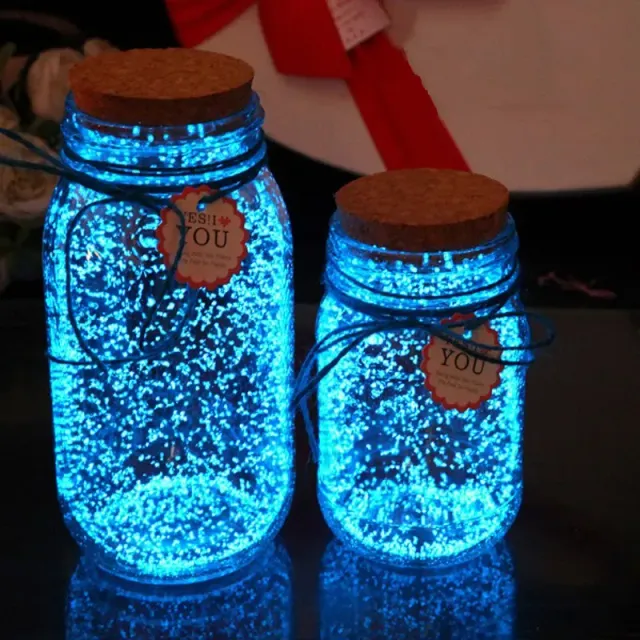 Bag of luminescent sand with colorful fluorescent powder, which shines in the dark - suitable for decoration such as jars