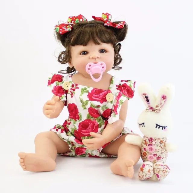 Realistic doll with accessories 55 cm