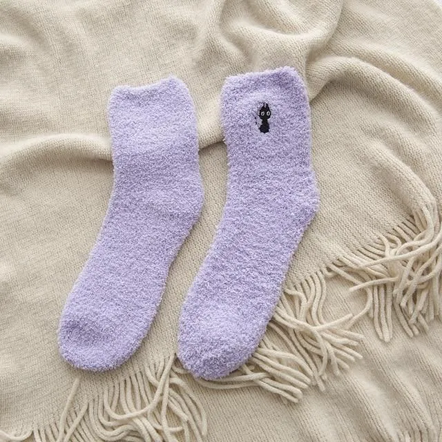 Warm socks in the shape of a paw