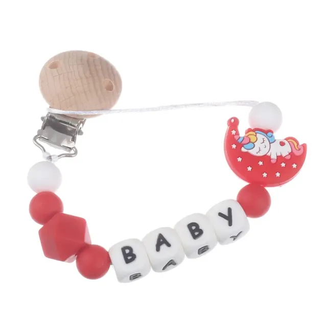 Silicone pacifier clip with motif of moon and bite