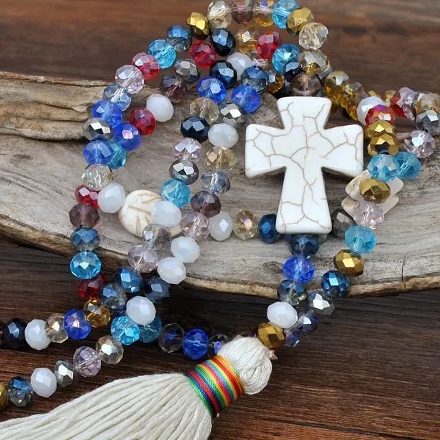 Coloured cross pendant with faceted glass