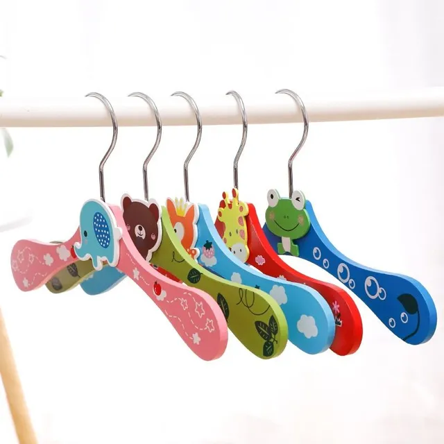 Wooden baby hanger with animal motifs