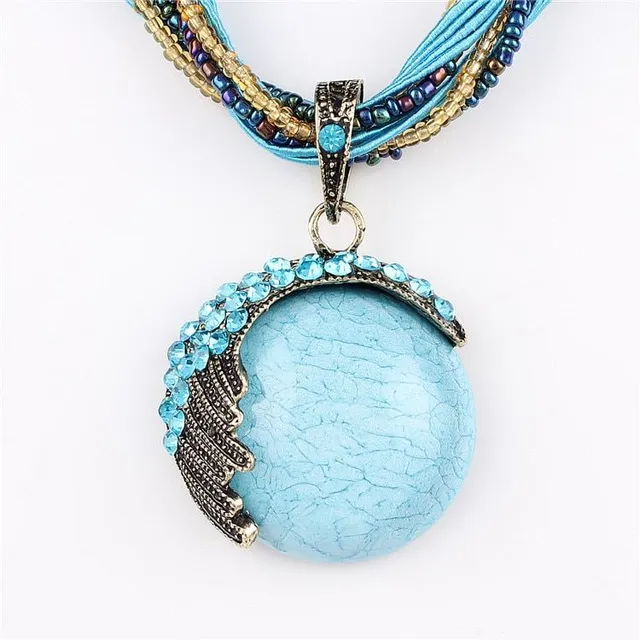 Women's beaded necklace with peacock