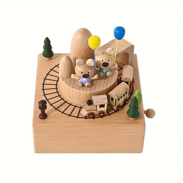 Wooden music box with rotating bears and train