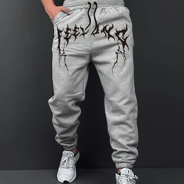 Men's streetwear track pants with print and drawstring waist, ideal for outdoor sports