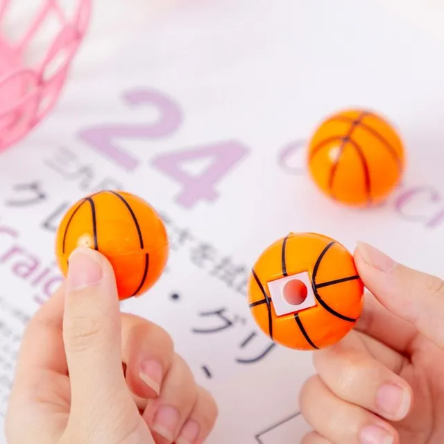 Modern pencil and crayon sharpener in the shape of a basketball