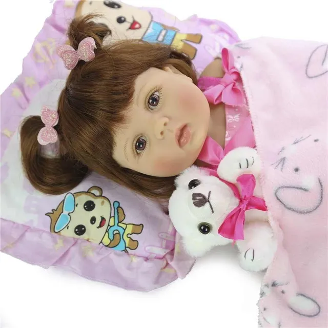 Realistic doll with accessories 57 cm