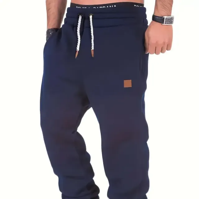 Classic men's narrowed tracksuits, free cut, slightly elastic waist, drawstring, autumn/winter, fitness and cycling