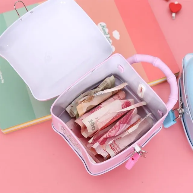 Children's portable cash box in a cute piggy bank shape
