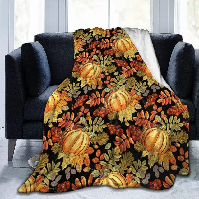 Autumn flannel blanket with a motif of pumpkins and leaves for sofa, bed or couch