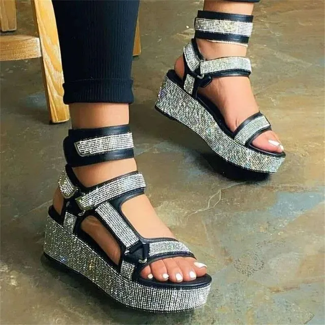 Summer strap sandals decorated with rhinestones on a high platform