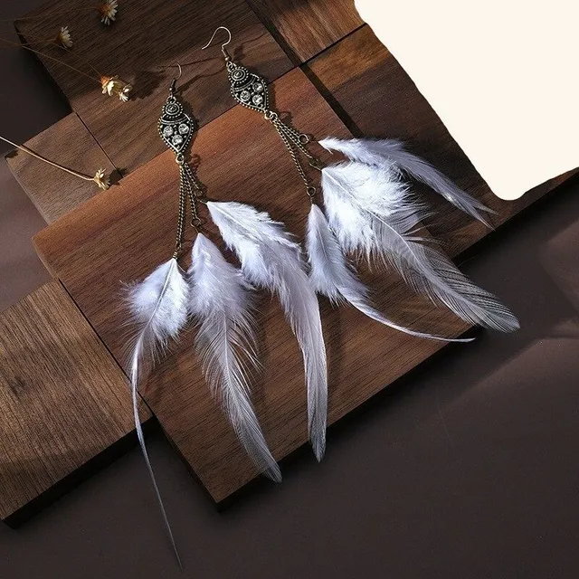 Women's dangle earrings with feathers