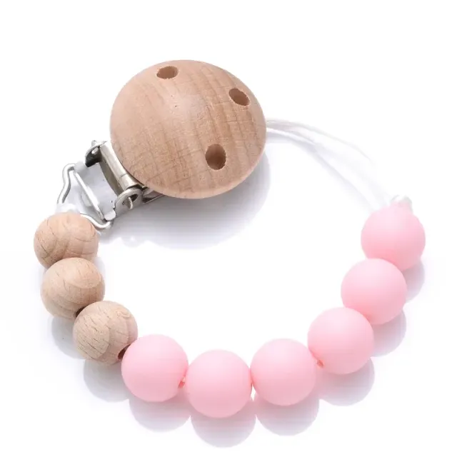 Wooden pacifier clip with silicone bite and round beads