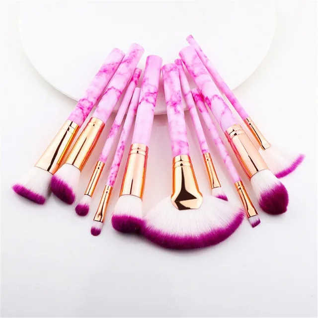 Set of make-up brushes in marble design