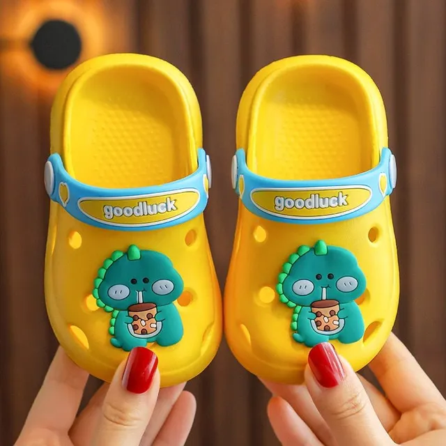 Children's perforated foam slippers with cute accessory