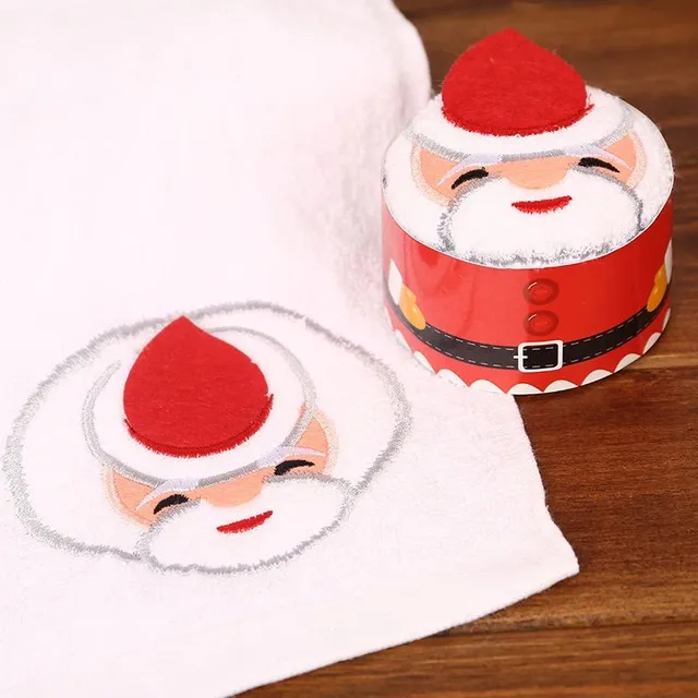 Vianočný uterák zabalený v darčeku