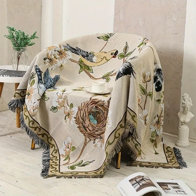 Decorative sofa cover with motifs of flowers and birds