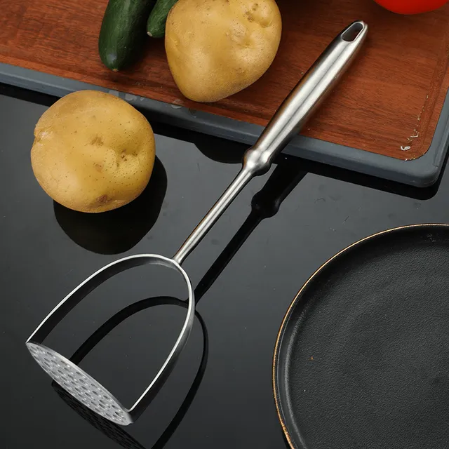 Stainless steel lichen and potato crusher - manual kitchen tool for pressing potatoes and garlic, with ergonomic handle