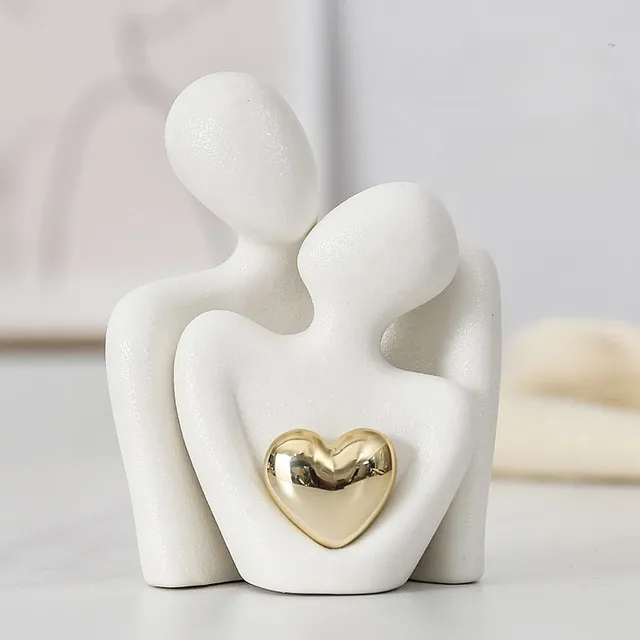 Decorative ceramic figure with motif hug and gold heart