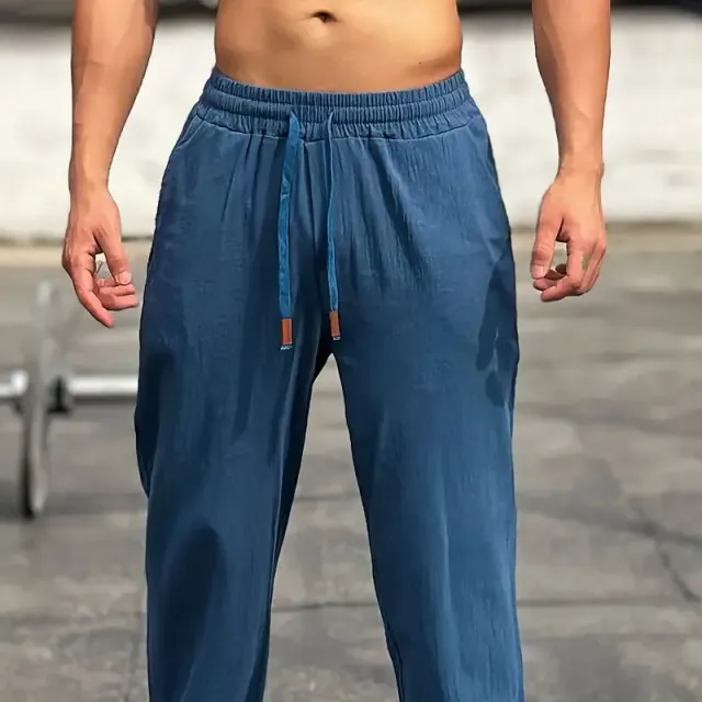 Comfortable men's sweatpants made of cotton, free cut, suitable for outdoor activities