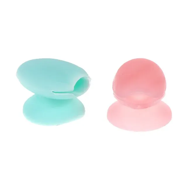 Practical silicone cover with suction cup for lip gloss applicators and eye shadows