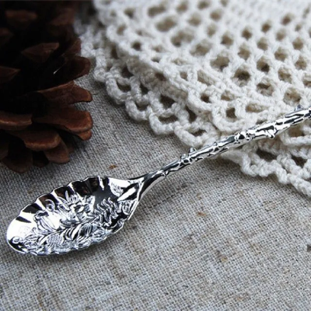 Decorative teaspoon with flowers