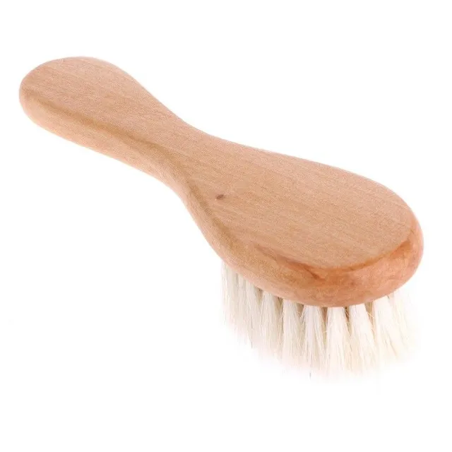 Brosse pour les premiers cheveux de bébé