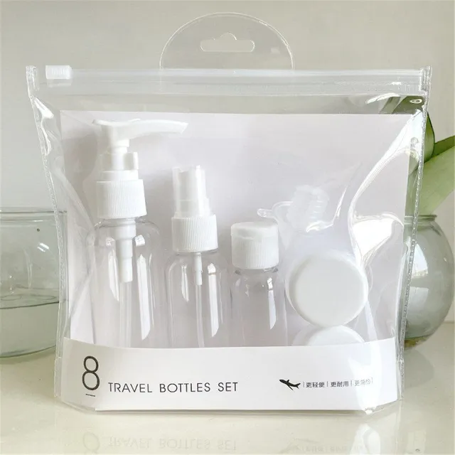 Luxury set of travel bottles in transparent design in a pouch