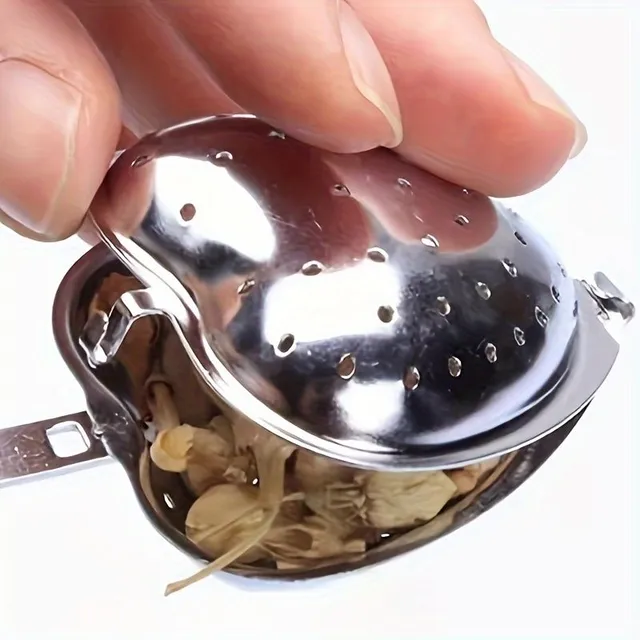 Practical tea sieve in the shape of a heart made of stainless steel with comfortable handle