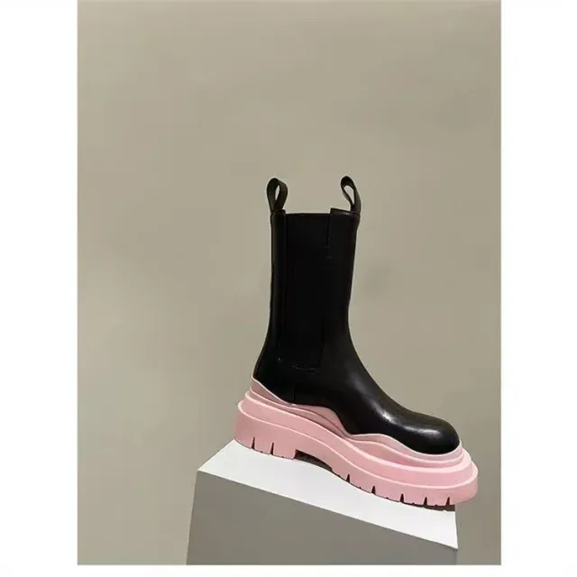 Women's winter boots on a platform with a rough sole